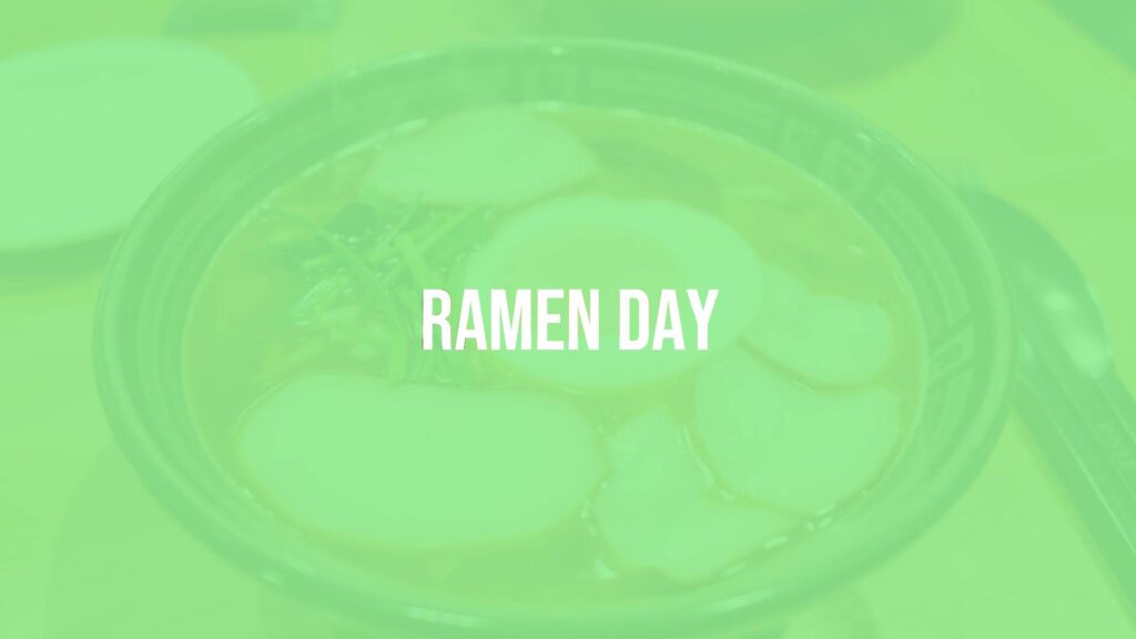 A steaming bowl of ramen with rich broth, soft-boiled egg, green onions, and sliced pork on top, placed on a wooden table, cozy atmosphere, realistic.